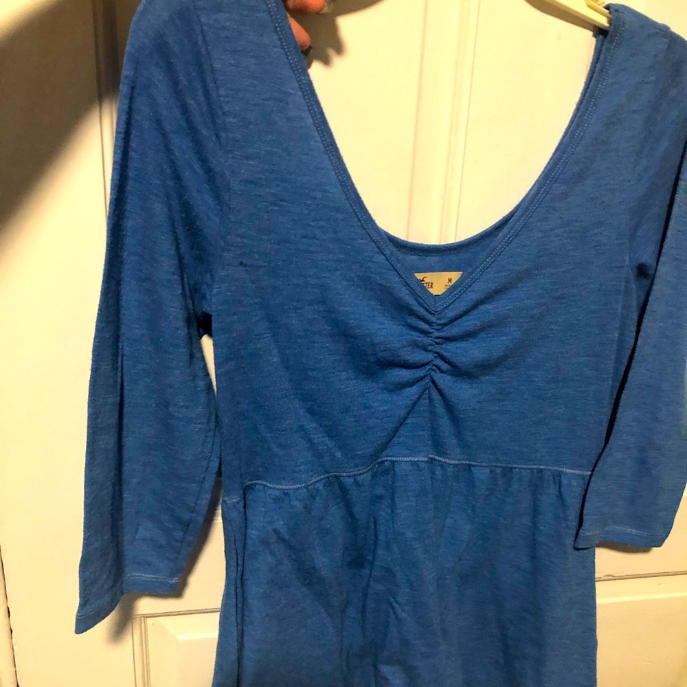 Light blue quarter sleeve baby doll shirt, deep V